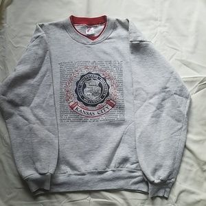 University of Missouri sweatshirt.